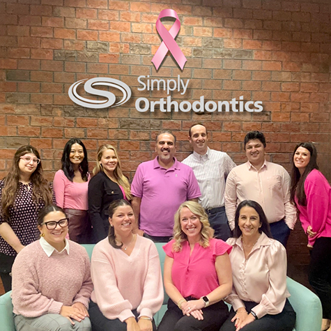 Simply Orthodontics team wearing pink for breast cancer awareness