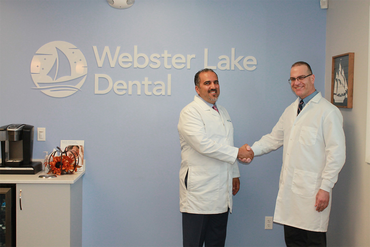 Doctor Sam Alkhoury shaking hands with doctor.