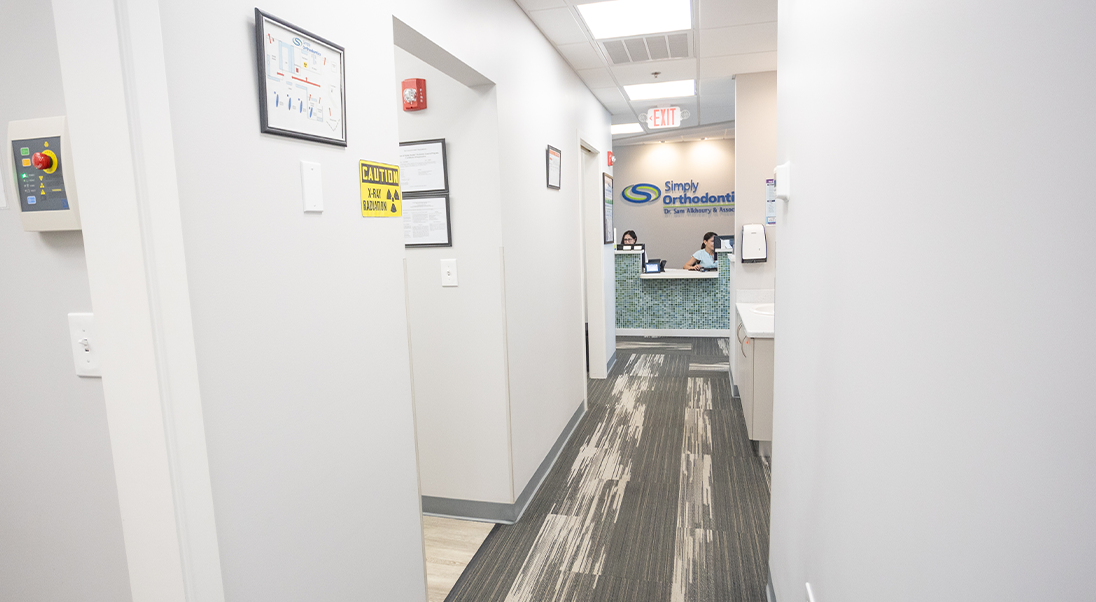 Hallway between the reception area and treatment rooms