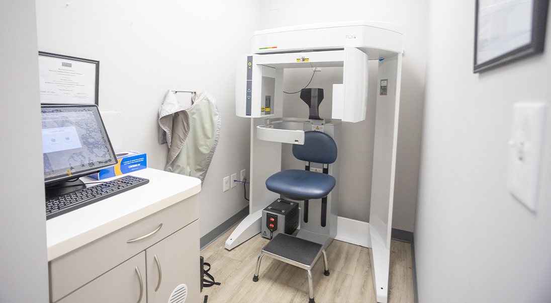 Cone beam CT scanner standing in the corner