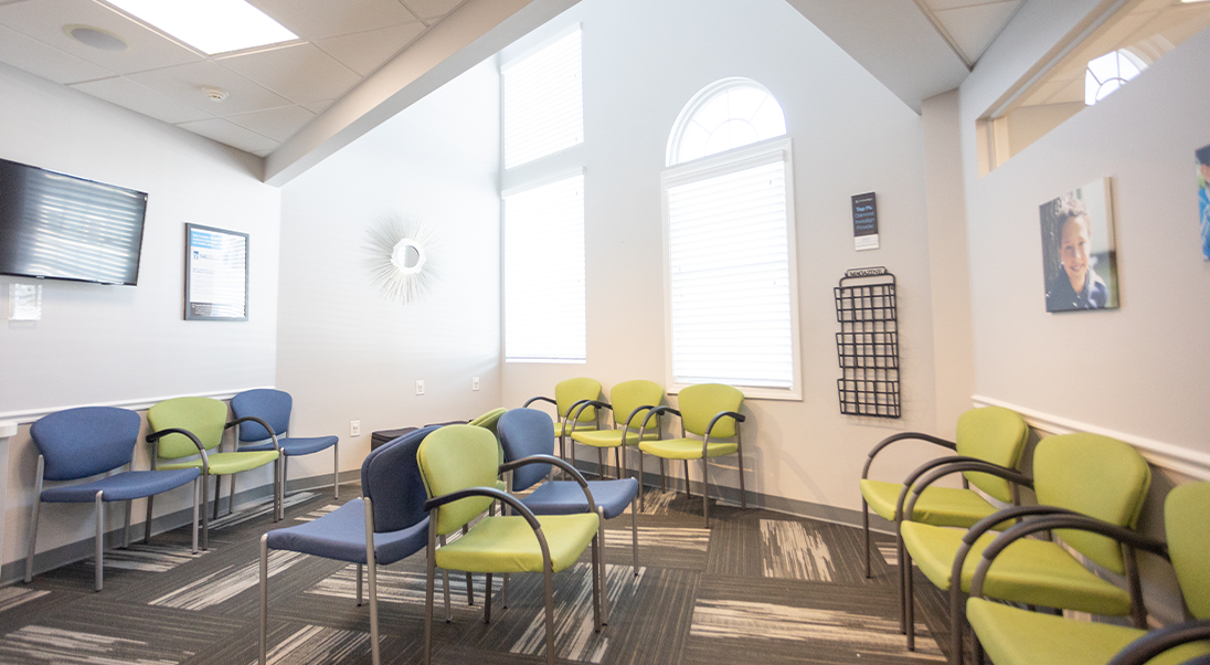 Green and blue chairs in the waiting room