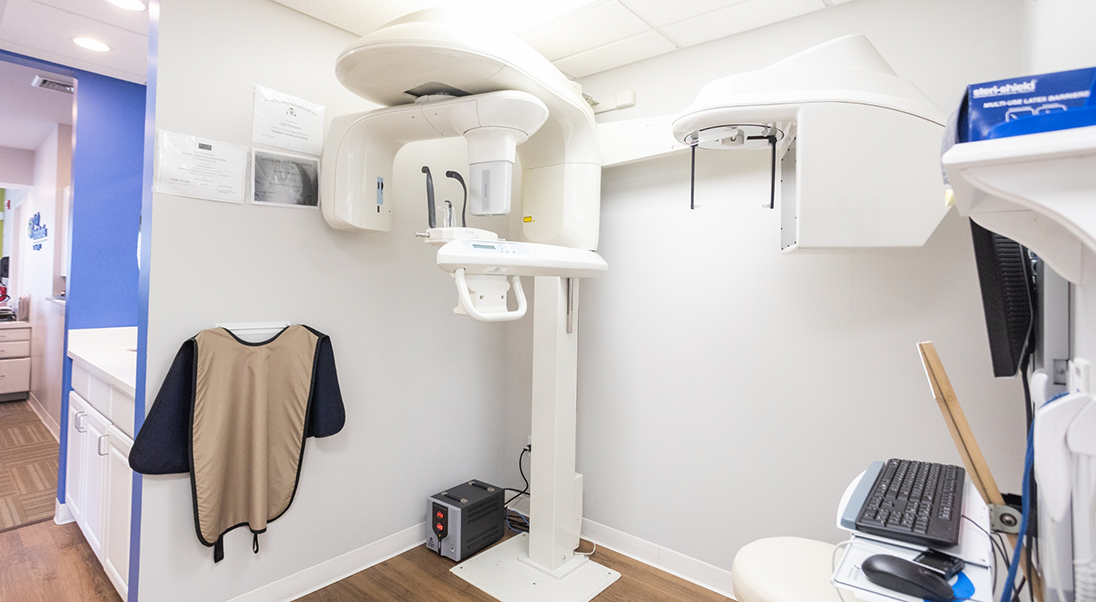 Cone beam scanning machine standing against a wall