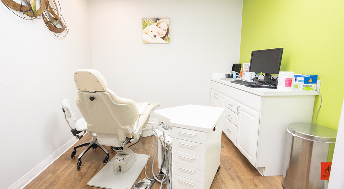 Treatment room with light green walls