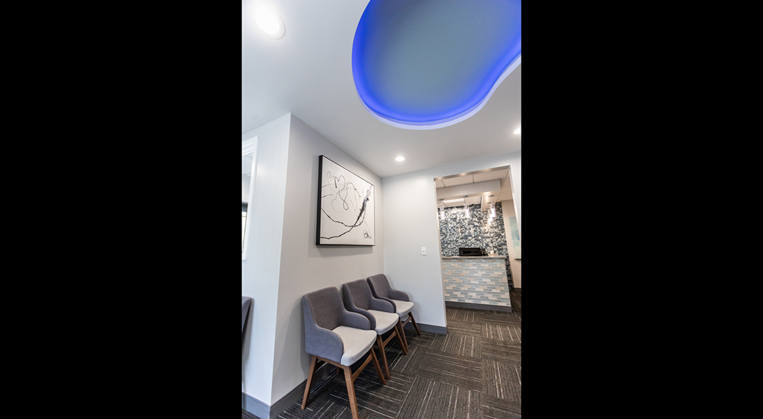 Blue light fixture on the ceiling in the waiting area