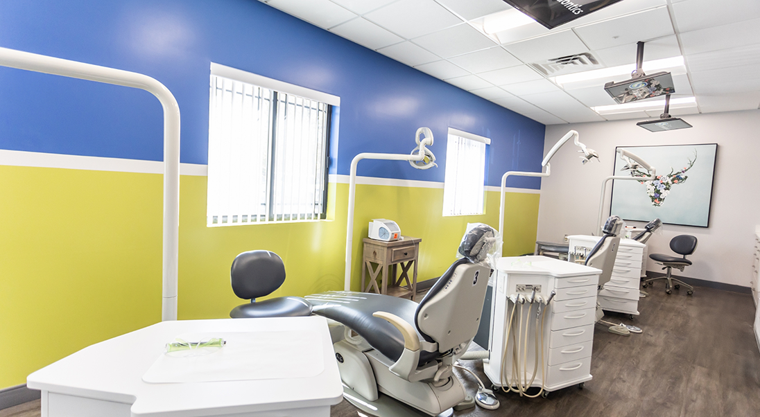 Row of orthodontic treatment chairs