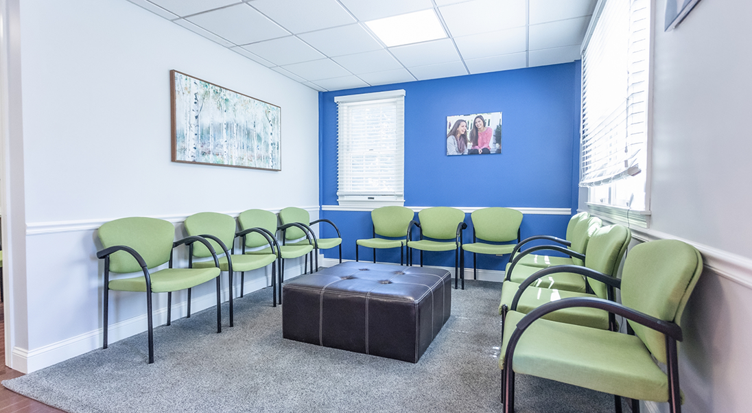 Three rows of green chairs