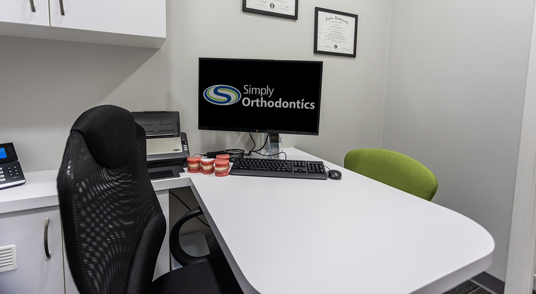 Computer on a desk in a consultation room