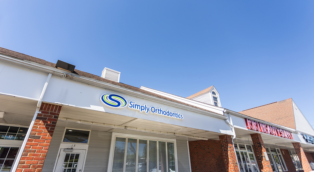 Simply Orthodontics Milford sign on the outside of the office