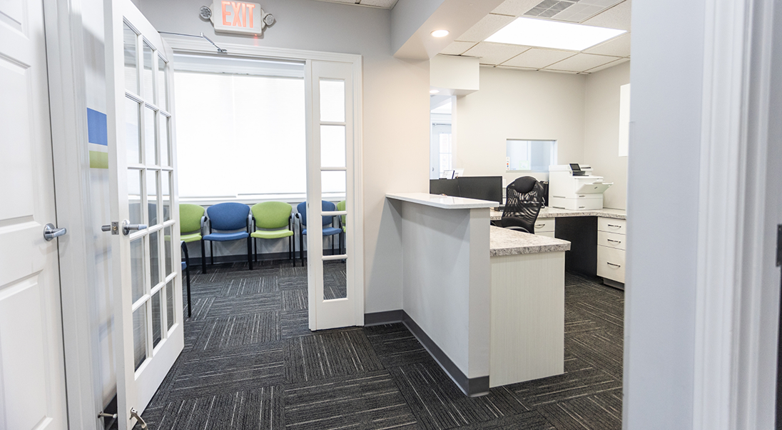 Behind the front desk