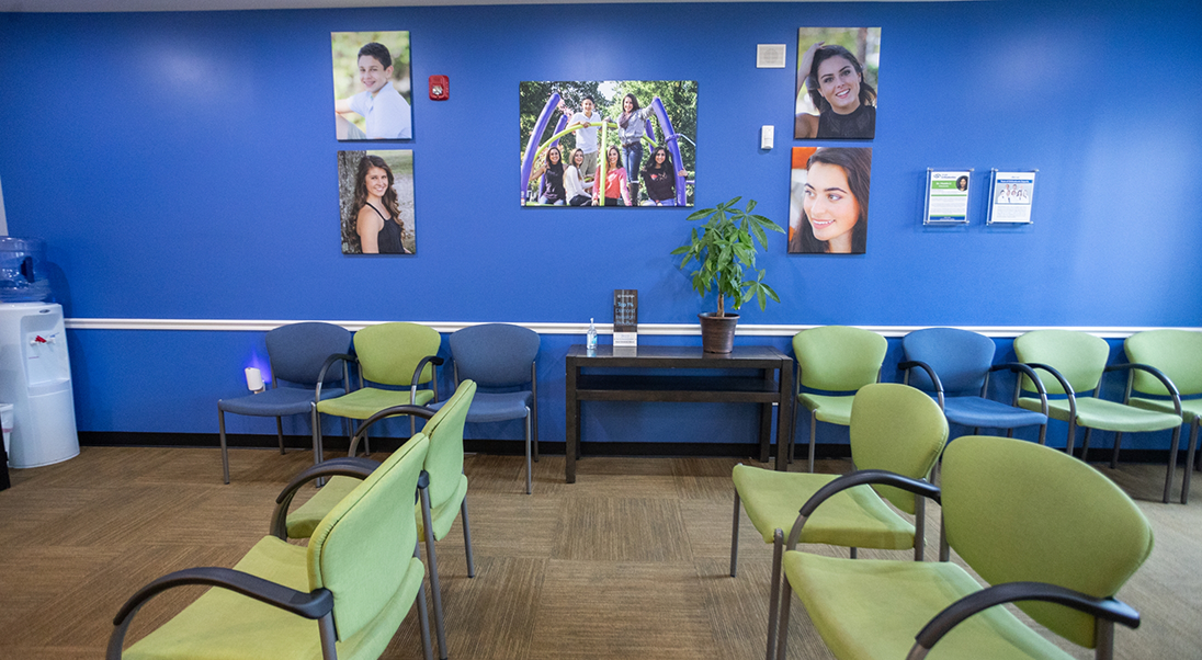 Green and blue chairs in the waiting room