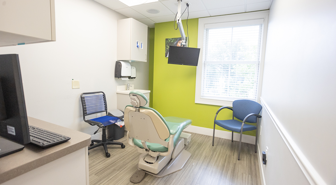 Exam room with one bright green wall