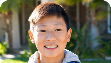 Smiling teen boy with braces