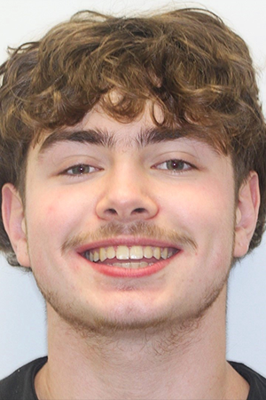 Smiling teenage boy with straight teeth