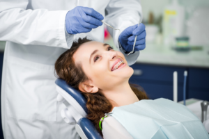 a patient with braces during an orthodontic appointment 