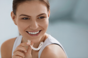 a person admiring their straightened teeth