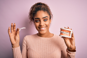 an orthodontic patient smiling confidently